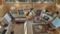 Looking down into the living room and dining room